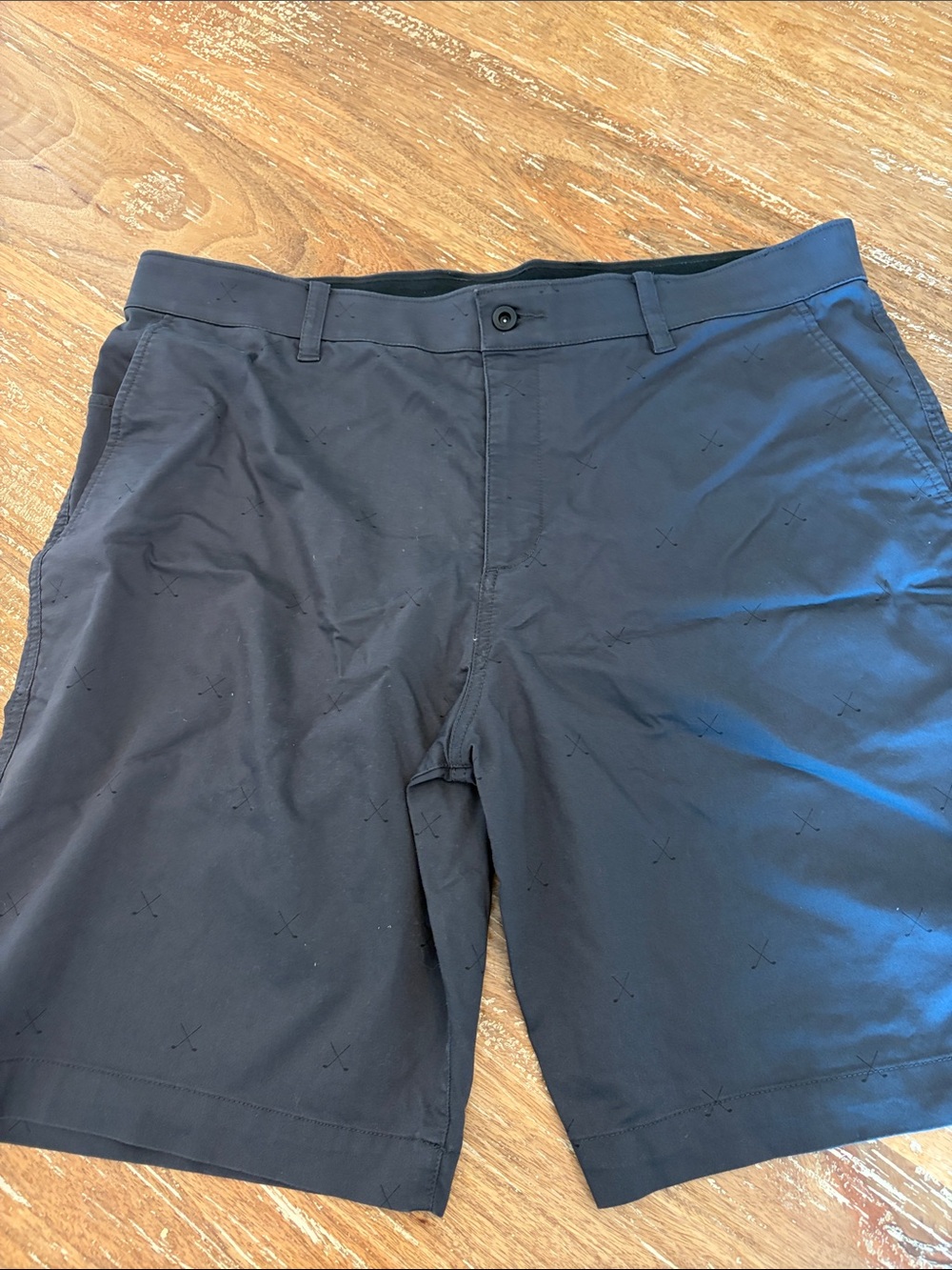 Nike Men's Black Flat-Front Golf Shorts with Subtle Stitch Pattern